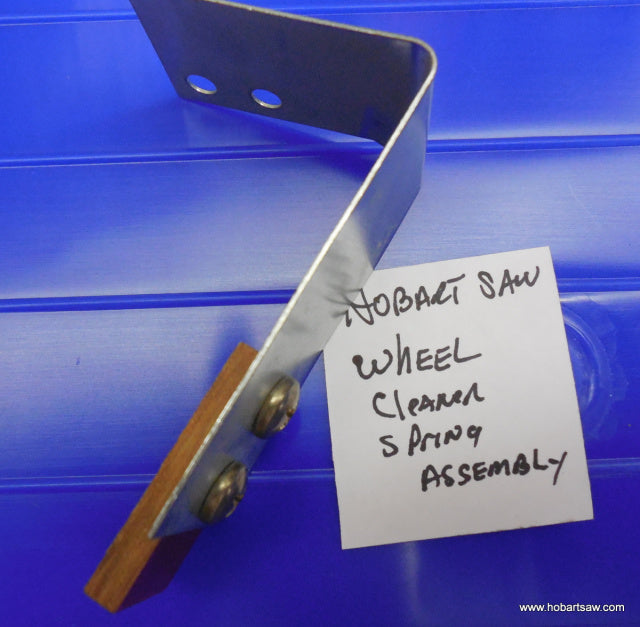 Spring Wheel Cleaner for Hobart 5212, 5214, 5216 Saws. Replaces 101934.