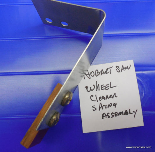Spring Wheel Cleaner for Hobart 5212, 5214, 5216 Saws. Replaces 101934.